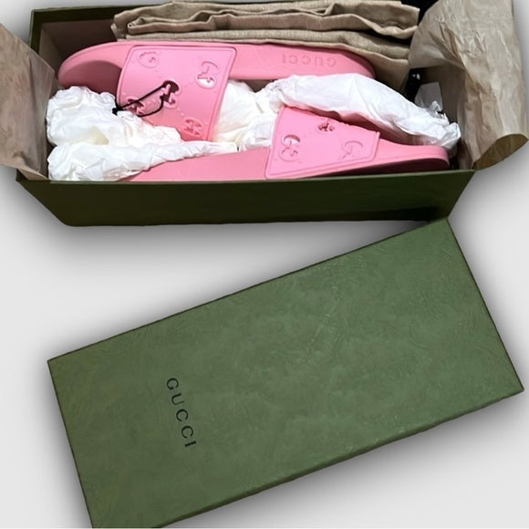 New authentic Gucci rubber slides in pink
